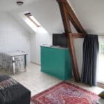 espace repas et salon de l'appartement hotelier de la maison cerviña